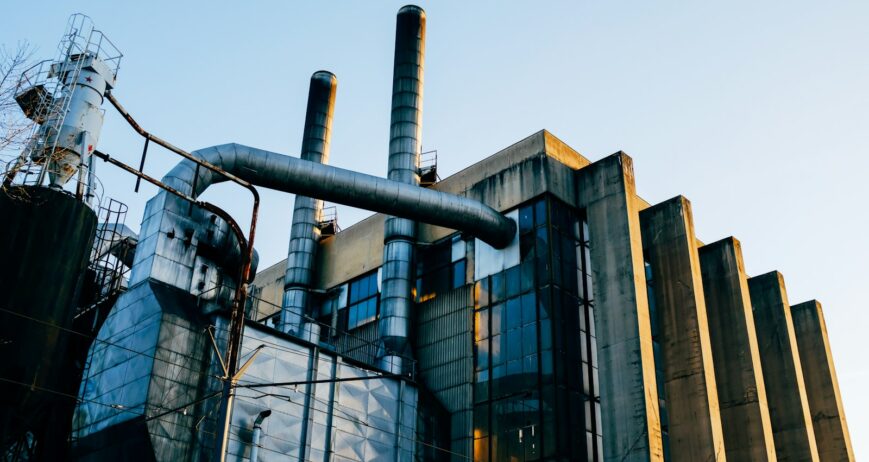 Industrial processing plant tower, representing a grain-based ethanol distillery
